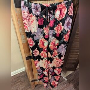 silk PJ bottoms by Victoria Secret with pockets, floral purple and black XS.